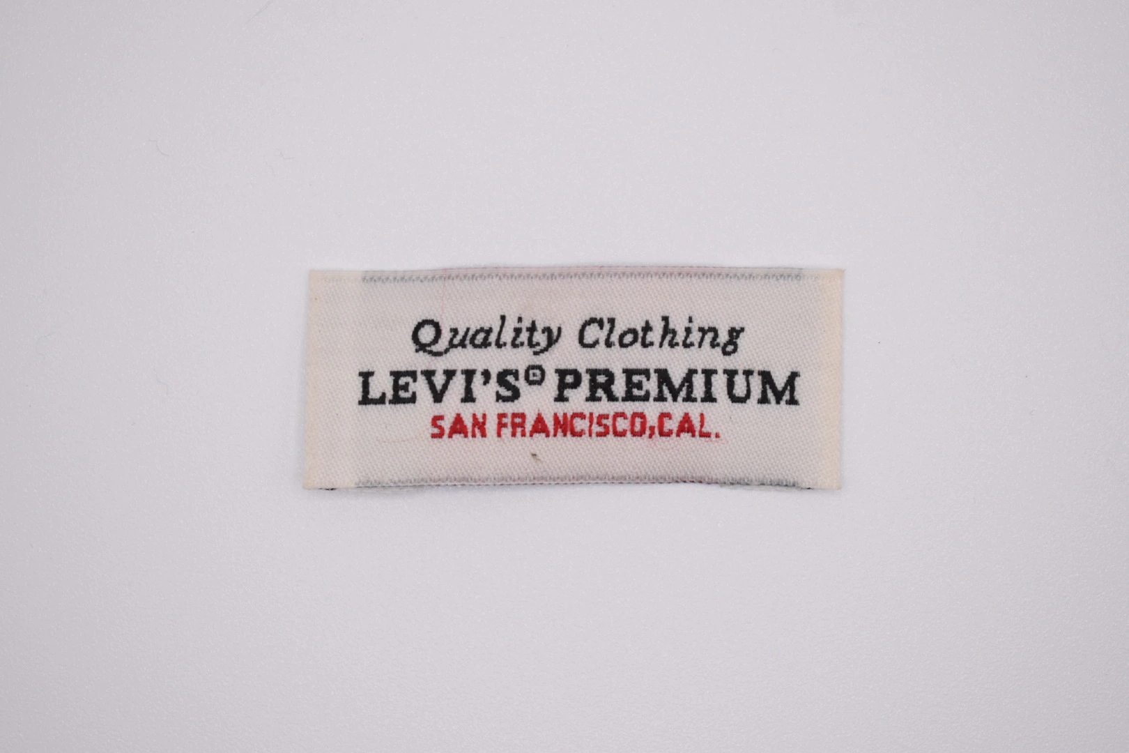 Levi's Premium end-fold woven brand label — front view, design reference woven label sample