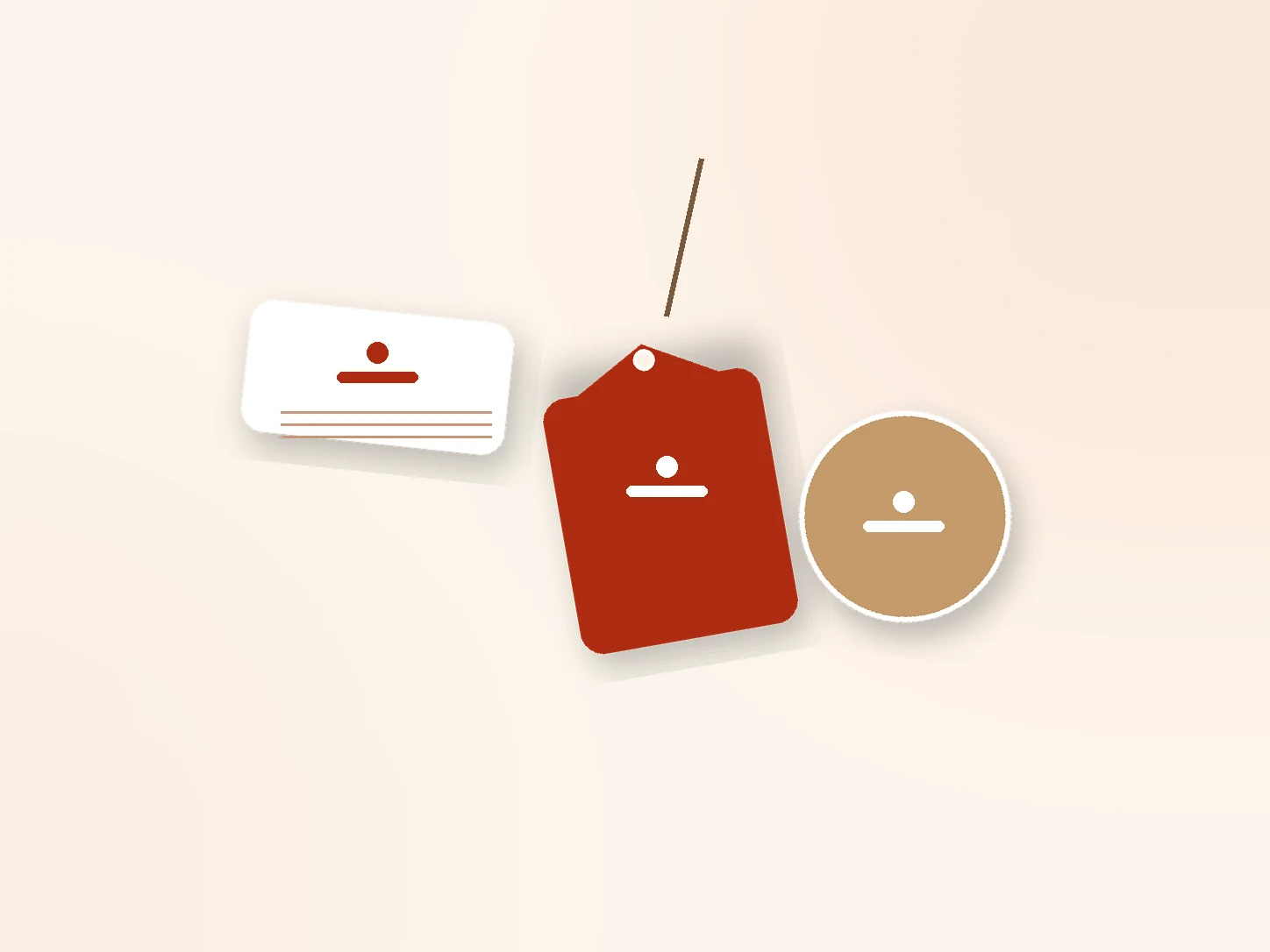 A woven neck label, a printed hang tag and a brand sticker side by side